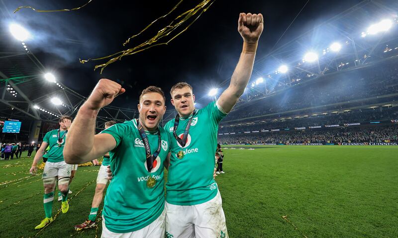 Ireland’s Jordan Larmour and Garry Ringrose celebrate the victory over Scotland and winning the Six Nations at the Aviva Stadium. Photograph: Dan Sheridan/Inpho