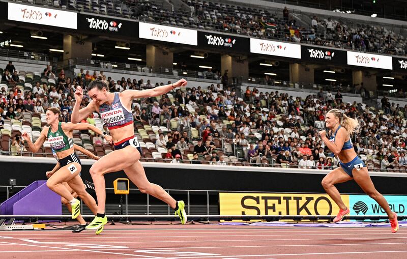 Ireland's athlete Kate O'Connor (left) crosses the finish line in the women's heptathlon 100m hurdles in a personal best time. Photograph: Jewel Samad / AFP