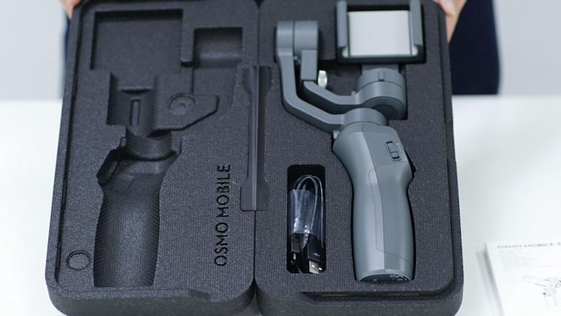 Osmo Mobile 2: fits multiple smartphones and the spring-loaded holder expands to fit larger devices, and keeps a good grip on them.