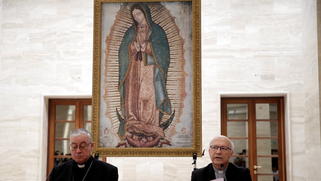 Chilean bishops Luis Fernando Ramos Perez and Juan Ignacio Gonzalez Errazuriz read statements during a news conference after a meeting Pope Francis at the Vatican. Photograph: Max Rossi/Reuters