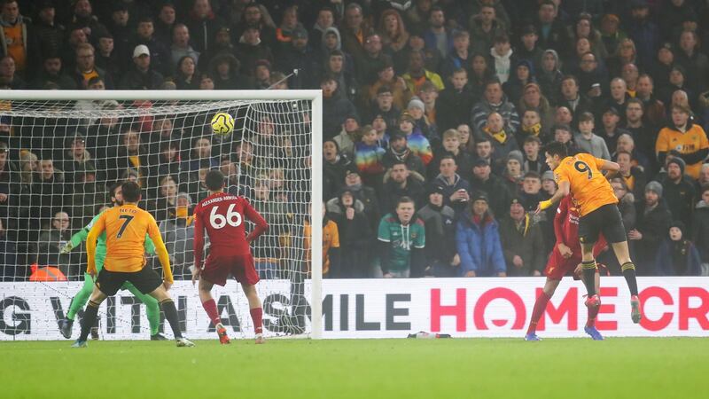 Raul Jimenez equalises for Wolves against Liverpool. Photograph: Catherine Ivill/Getty