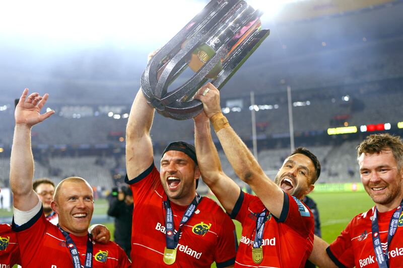 Munster’s Keith Earls, Tadhg Beirne, Conor Murray and Peter O’Mahony celebrate with the URC trophy in Cape Town in 2023. Photograph:
Steve Haag/INPHO