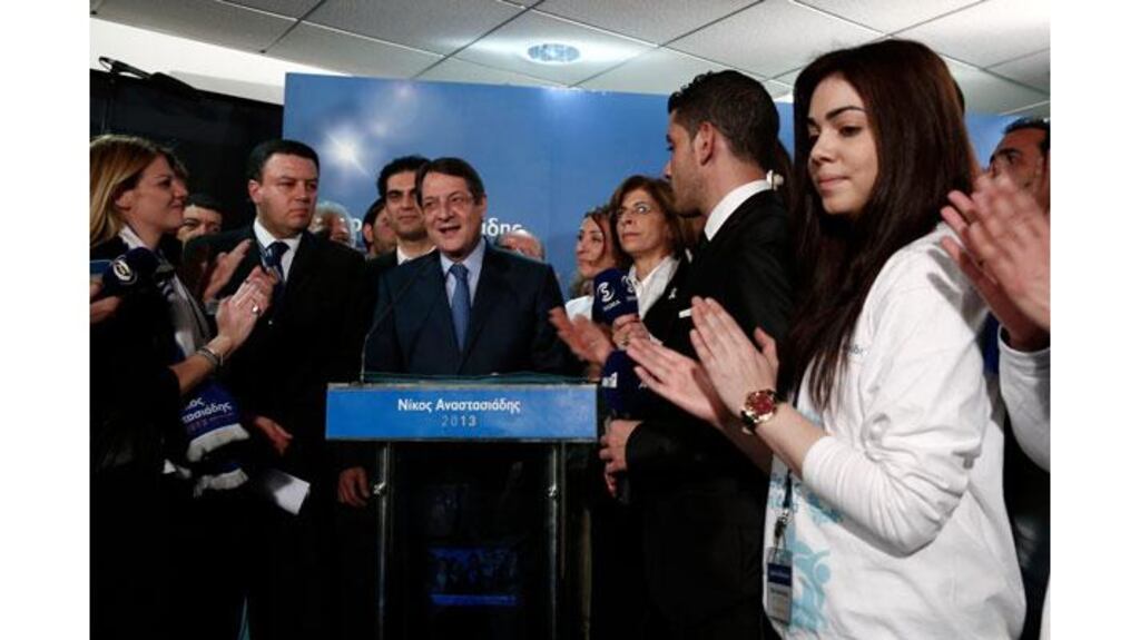 Cyprus presidential candidate Nicos Anastasiades of the right wing Democratic Rally party makes statements at the party's polling station in Nicosia. Photograph: Yorgos Karahalis/Reuters