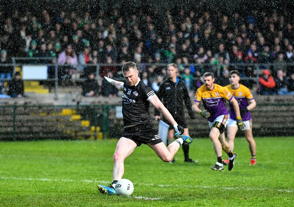 Paul Devlin of Kilcoo scores a penalty in their Ulster Championship clash with Derrygonnelly Harps. Photograph: Andy Paton/Inpho