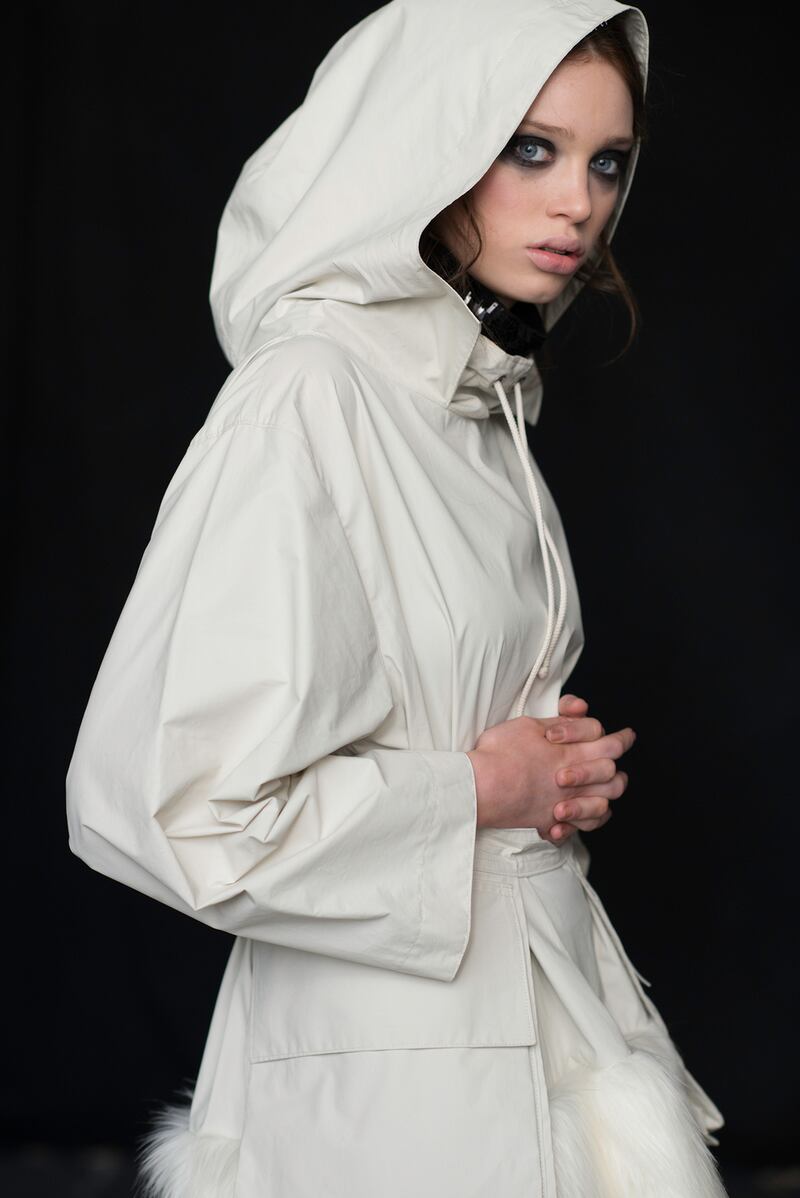 New ski parka with faux-fur trim €400, white PU-coated cotton trouser with ribbon stripe €200, night rain sequin neckpiece €50