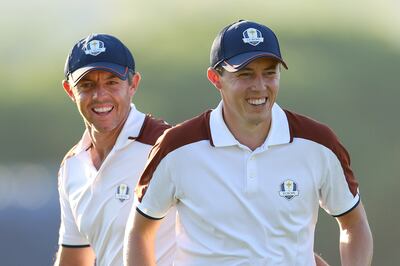 Matt Fitzpatrick shares a laugh with Rory McIlroy during a fourball match in Rome. Photograph: Andrew Redington/Getty Images