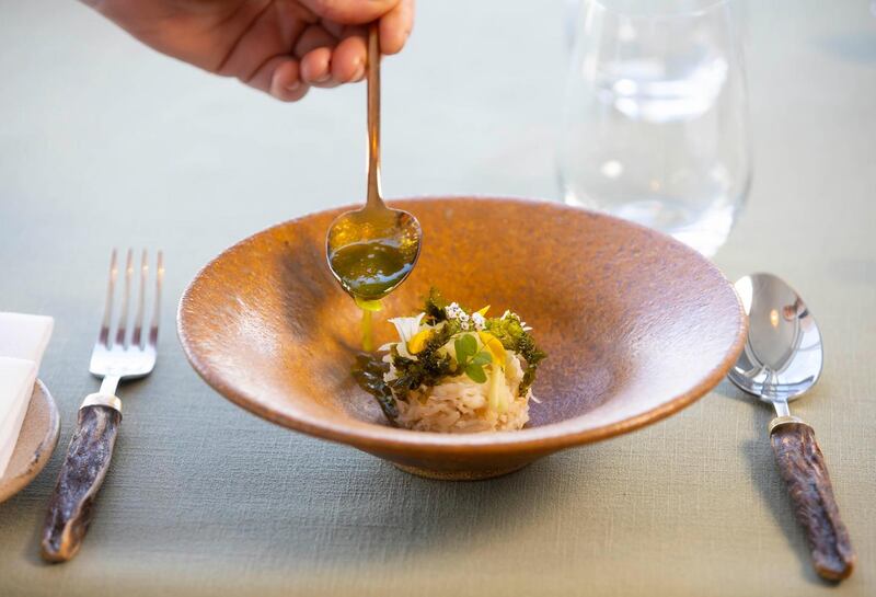 Roisin O'Connor's Copper Coast crab with kohlrabi, crispy sea lettuce, pea shoots, gorse flowers and a gorse broth, split with tarragon oil. Photograph: Patrick Browne