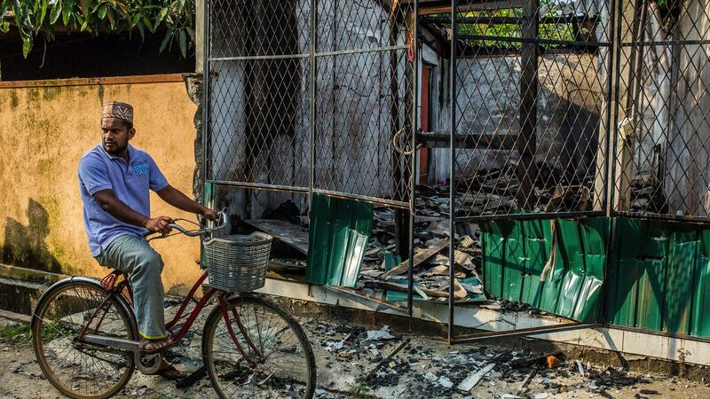The ruins of a shop in Gintota, Sri Lanka, after mobs of Buddhists from Sri Lanka’s Sinhalese majority marauded through the village, in November 2017. Photograph: Minzayar Oo/The New York Times