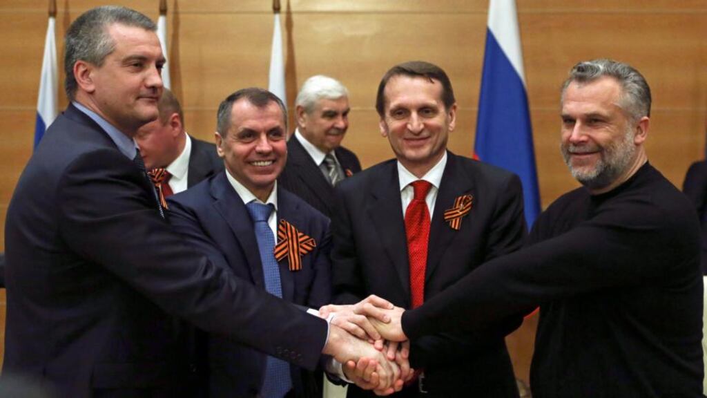 Speaker of the Russian State Duma, Russia’s lower parliament house, Sergei Naryshkin (2nd R) shakes hands with leaders of the Crimean parliamentary delegation speaker Vladimir Konstantinov (2nd L), prime minister Sergei Aksyonov (L) and Sevastopol Mayor Alexei Chaliy during a meeting in Moscow. Photograph: Sergei Karpukhin/Reuters.