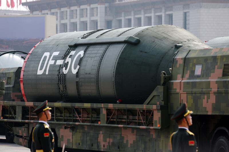 An armoured vehicle carrying the DF-5C liquid-fuelled intercontinental strategic nuclear missile is seen during the military parade. Photograph: Wu Hao/ EPA
