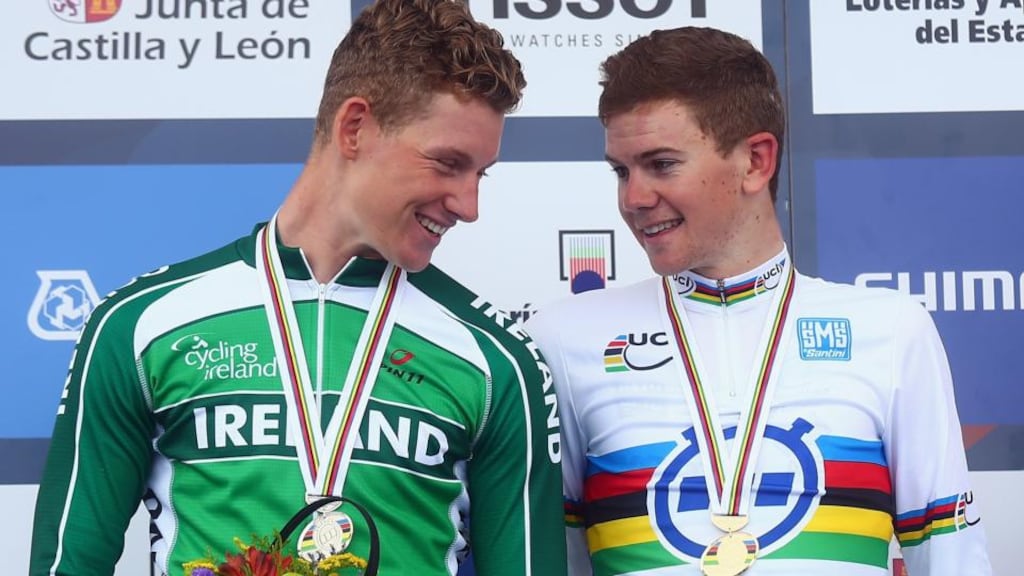 Silver medal winner Ryan Mullen of Ireland chats to race winner Campbell Flakemore of Australia on the podium for the under-23 Men’s Individual Time Trial on day two of the UCI Road World Championships in Ponferrada, Spain. Photograph: Bryn Lennon/Getty Images