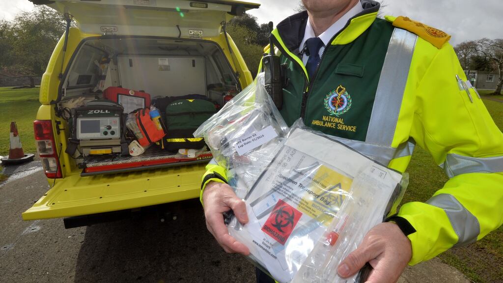 Richard Quinlan, chief ambulance officer for north Leinster and advanced paramedic, with a Covid-19 testing kit. Photograph: Alan Betson / The Irish Times