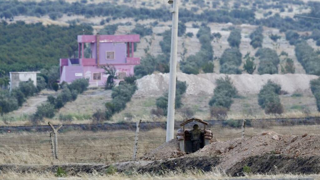 A Turkish soldier at the Turkish-Syrian border in Karkamis, bordering with the IS-held Syrian town of Jarablus, in Turkey. Photograph: Murad Sezer/Reuters