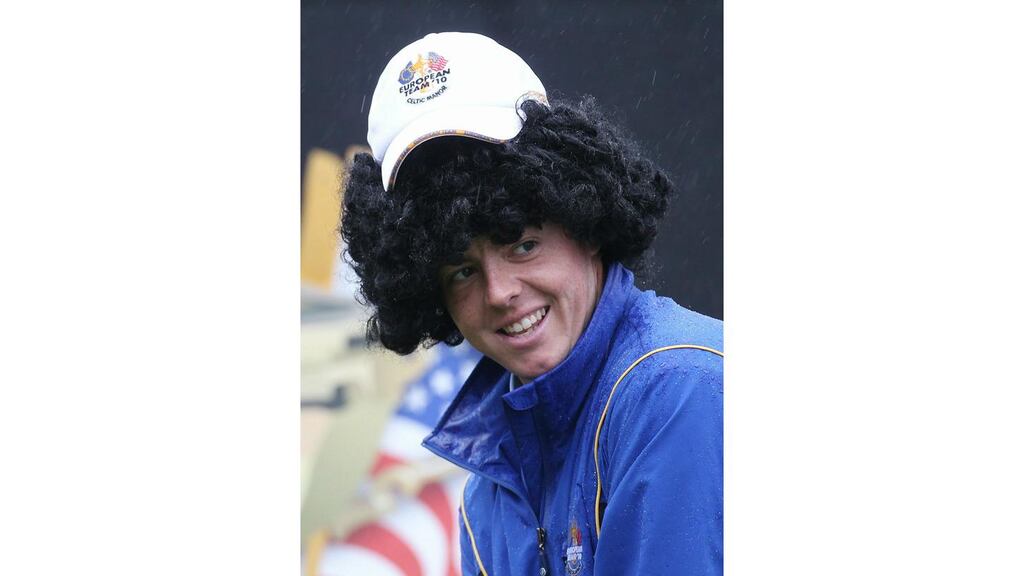 Rory McIlroy of Europe smiles as he wears a wig during a practice round prior to the 2010 Ryder Cup at the Celtic Manor Resort. - (Photograph: Ross Kinnaird/Getty Images)