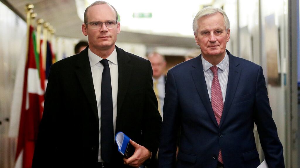 Minister for Foreign Affairs Simon Coveney and the EU chief Brexit negotiator Michel Barnier in Brussels, Belgium, in March. File photograph: Olivier Hoslet/Pool via Reuters
