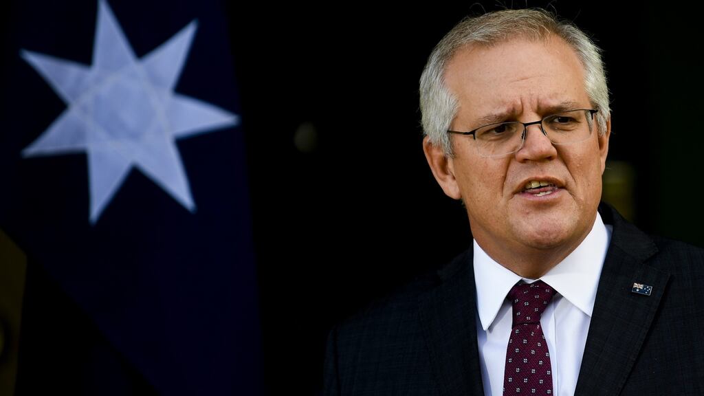 Australian prime minister Scott Morrison speaks to the media in Canberra on Thursday. Photograph: Lukas Coch/EPA