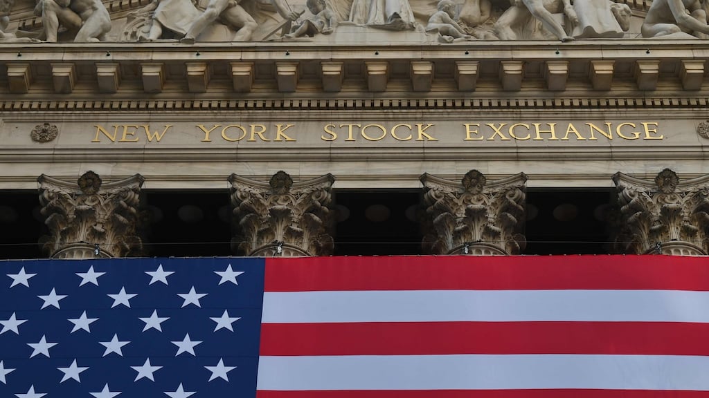 Wall Street hit record levels as market participants bet on more coronavirus relief aid under a Democrat-controlled Congress. Photograph: Angela Weiss/AFP