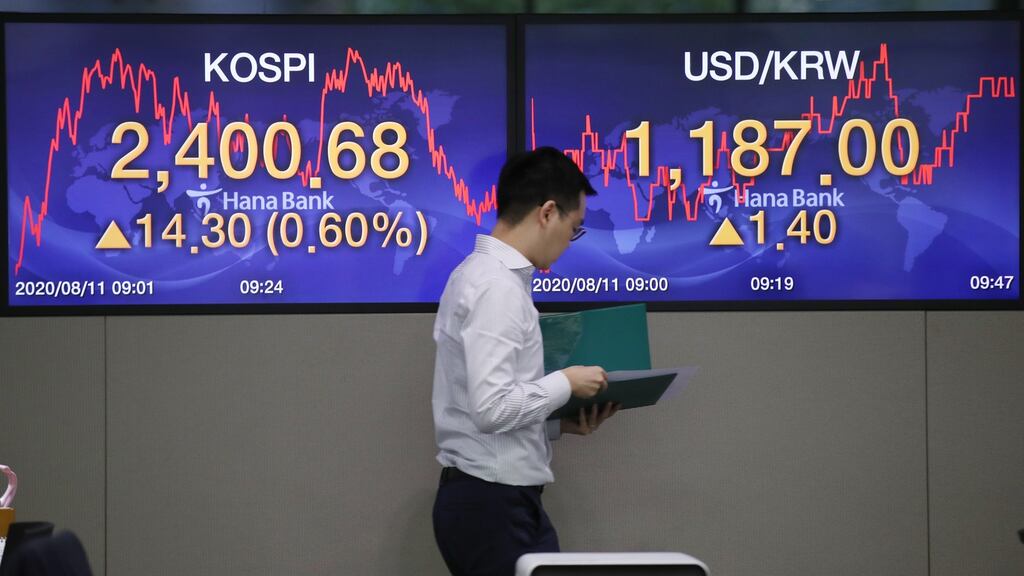 An electronic signboard shows the benchmark Korea Composite Stock Price Index (KOSPI) crossing the 2,400 mark during the morning trade session, at KEB Hana Bank in Seoul South Korea,. Photograph: Yonhap/ South Korea