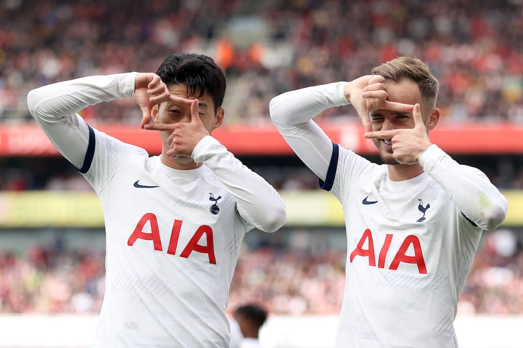 Heung-Min Son celebrates with James Maddison of Tottenham Hotspur. Photograph: Ryan Pierse/Getty