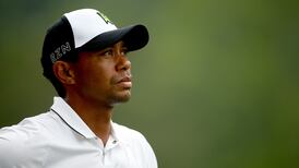 America at Large:  Woods and LeBron take divergent paths