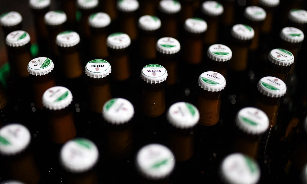 Take-home alcohol sales rose 11 per cent compared to pre-pandemic levels despite the minimum pricing law. While this would appear to raise question marks, analysts said more time was required to ascertain the impact of the public health measures. Inflationary pressures have led some people to drink at home rather than in bars and restaurants. Photograph: Ina Fassbender/AFP