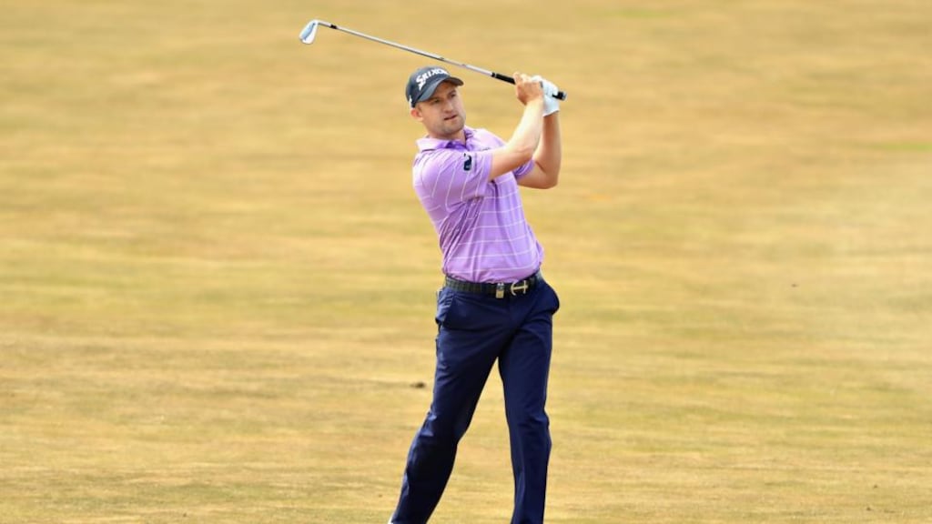 Scotland’s Russell Knox takes his second shot on the fourth hole during the third round of the Aberdeen Standard Investments Scottish Open at Gullane Golf Course. Photograph: Andrew Redington/Getty Images