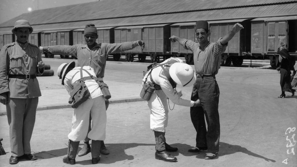 1937: Arab civilians being searched by British Military personnel in Palestine. Photograph: Getty Images