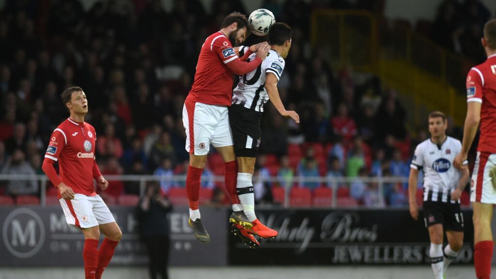Sligo Rovers’ Kyle McFadden and Jamie McGrath of Dundalk compete for the ball during their recent Airtricity League meeting. Photo: Ciaran Culligan/Inpho