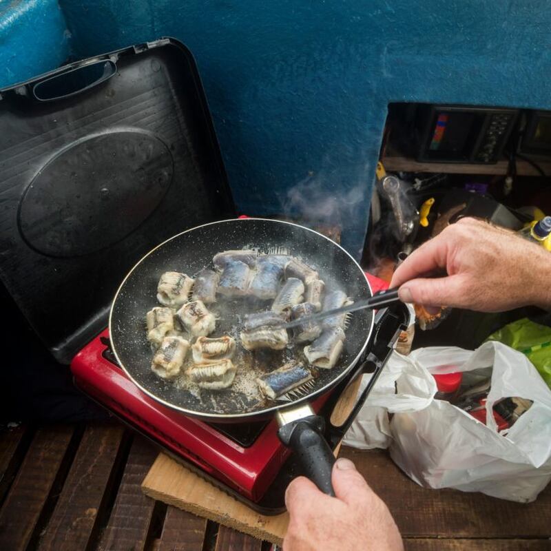 Gary McErlain fries some eel for breakfast. Photograph: Liam McBurney
