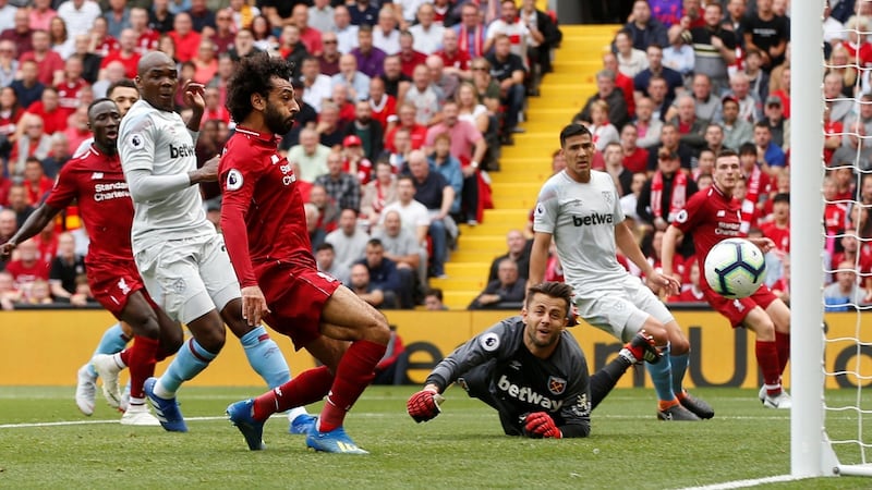 Salah scores the opener. Photo: Andrew Yates/Reuters