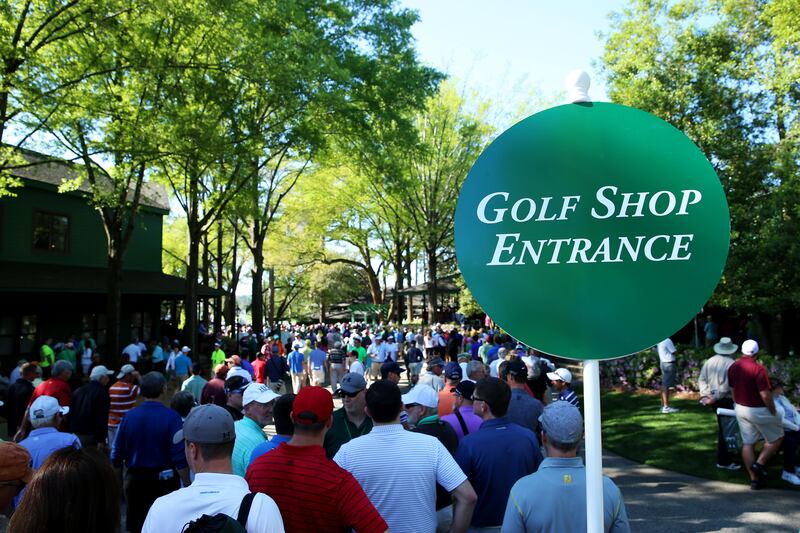 Patrons line up at the entrance to the golf shop at Augusta National Golf Club. Photo: Andrew Redington/Getty Images