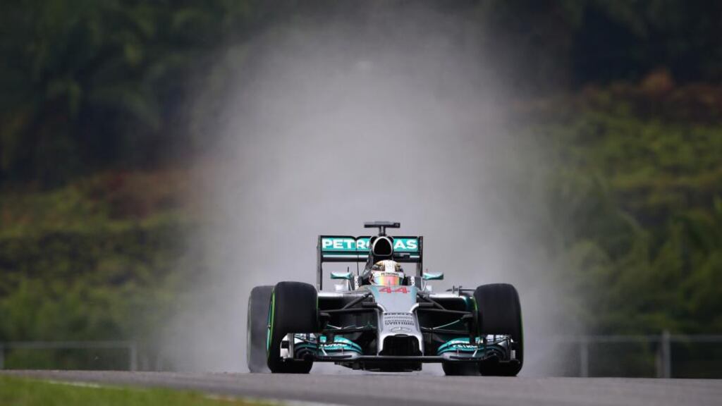 Lewis Hamilton of  Mercedes GP  during qualifying for the Malaysia Formula One Grand Prix at the Sepang circuit  in Kuala Lumpur. Photograph: Clive Mason/Getty Images
