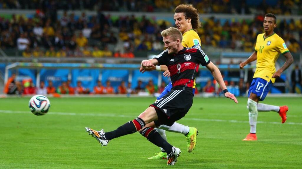 Twitter’s Brazilator service instantly converts World Cup tweets in 12 different languages into English. André Schürrle  scores Germany’s seventh goal during the 2014 Fifa World Cup semi-final  between Brazil and Germany. Photograph: Michael Steele/Getty Images
