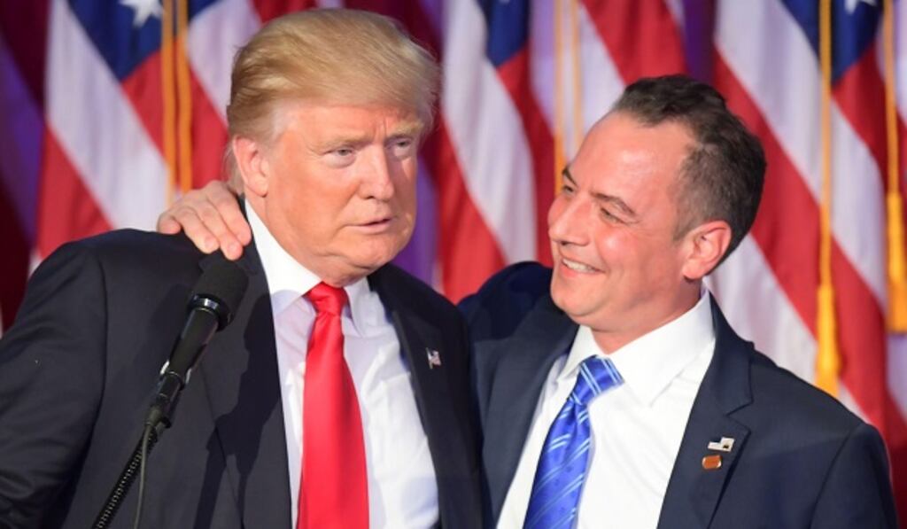 Chairman of the Republican National Committee (RNC) Reince Priebus (right) embracing President-elect Donald Trump during election night at the New York Hilton Midtown in New York. Photograph: Jim Watson/Getty Images