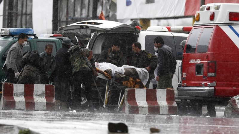 A man who was injured after the Taliban attack on the ministry of defence in Kabul is brought to hospital. Photograph: Jawad Jalali/EPA
