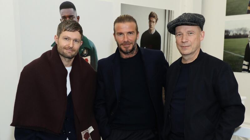 Daniel Kearns (left), David Beckham and Perry Ogden wearing Kent & Curwen attend the ‘The Boxer, The Artist & The Musician’. Photograph: Darren Gerrish/WireImage