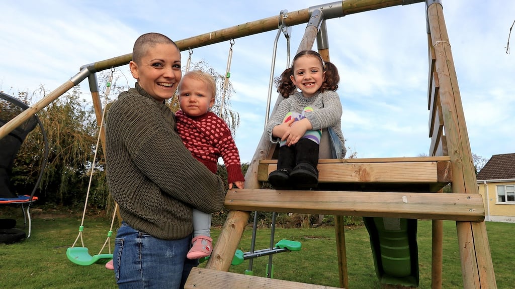 Geraldine Walsh with her children Devin and Allegra, who is discovering the benefits of lying. Photograph: Donall Farmer for The Irish Times
