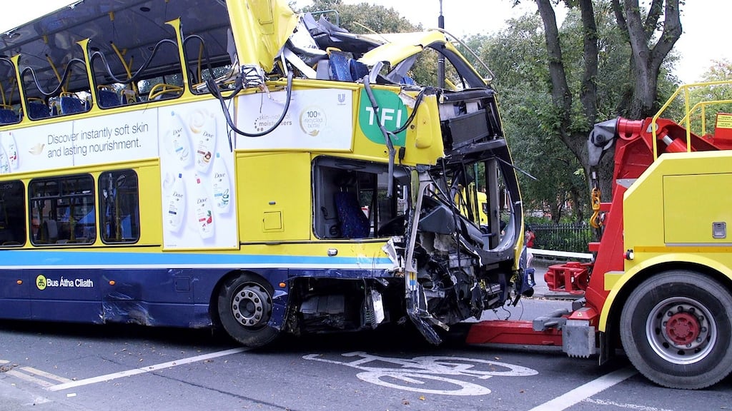 The Dublin Bus vehicle is towed away from the scene after the crash. Photograph: Bryan O’Brien / The Irish Times