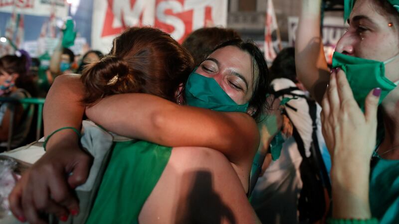 Abortion-rights activists react after lawmakers legalised abortion. Photograph: AP