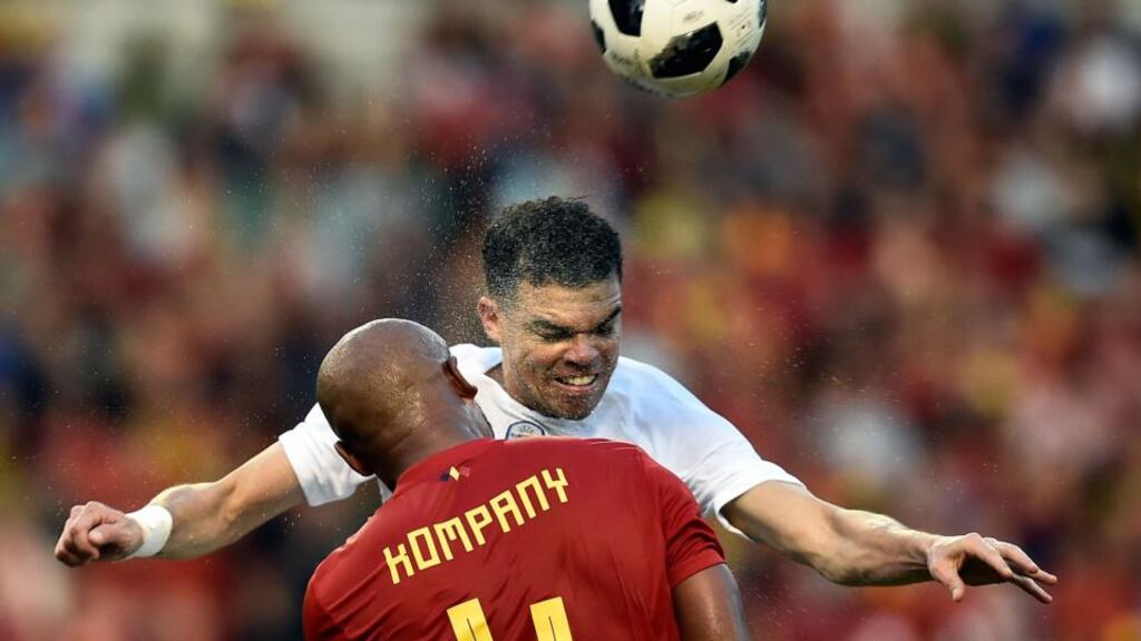 Vincent Kompany challenges with Pepe during Belgium’s goalless draw with Portugal. Photograph: John Thys/AFPes