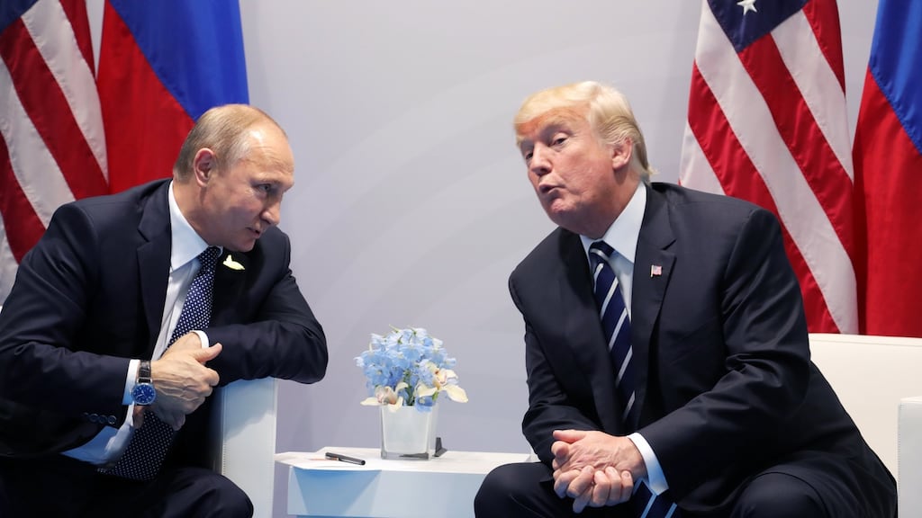 Russian president Vladimir Putin and US president Donald J Trump meet on the sidelines of the G20 summit in Hamburg last month. Photograph: EPA