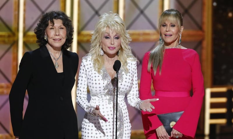 ‘If I’ve got something to say, I’ll say it’: Dolly Parton with Lily Tomlin and Jane Fonda at the 2017 Emmys. Photograph: CBS/Getty