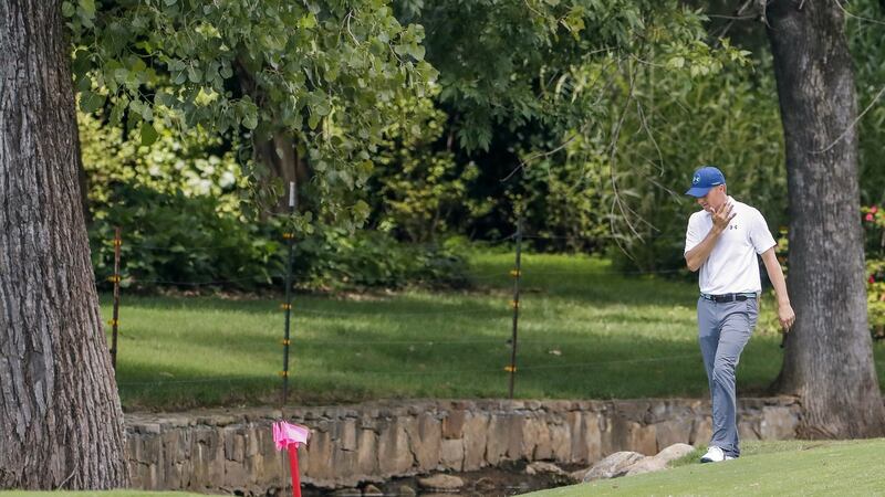 Jordan Spieth of the US approaches his ball on the seventh hole. Photo: EPA