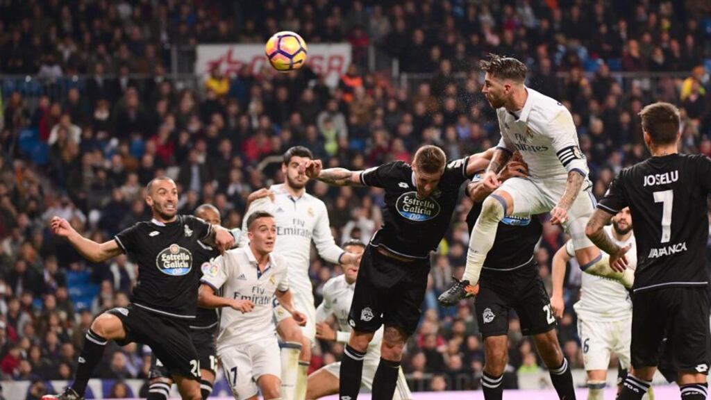 Real Madrid’s Sergio Ramos heads home the winning goal in injury time during the La Liga game against  Deportivo la Coruna  at the Santiago Bernabeu. Photograph: Pierre-Philippe Marcou/AFP/Getty Images