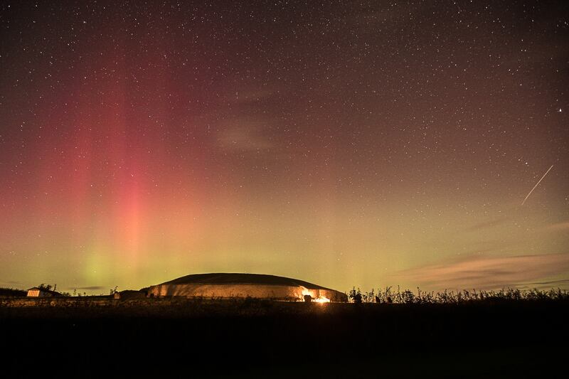 The Aurora Borealis over Newgrange. Photograph: Damian Smith