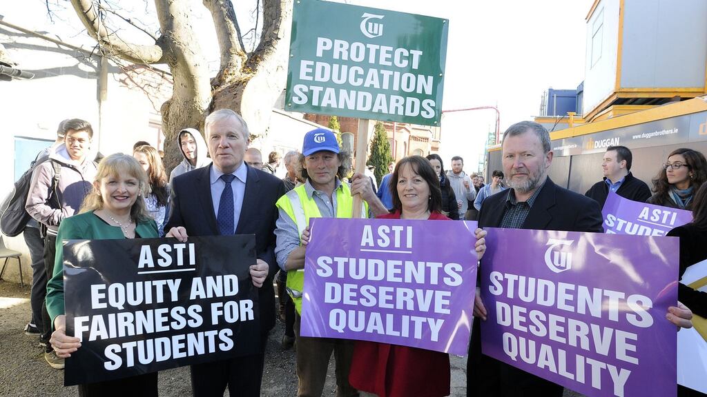 File image: The Association of Secondary Teachers in Ireland (ASTI) staged a demonstration outside the Department of Education on Friday in protest at what it described as unprecedented interference in a ballot currently underway on whether members should cease working 33 non-teaching hours agreed under the former Croke Park agreement. Photograph: Dave Meehan.