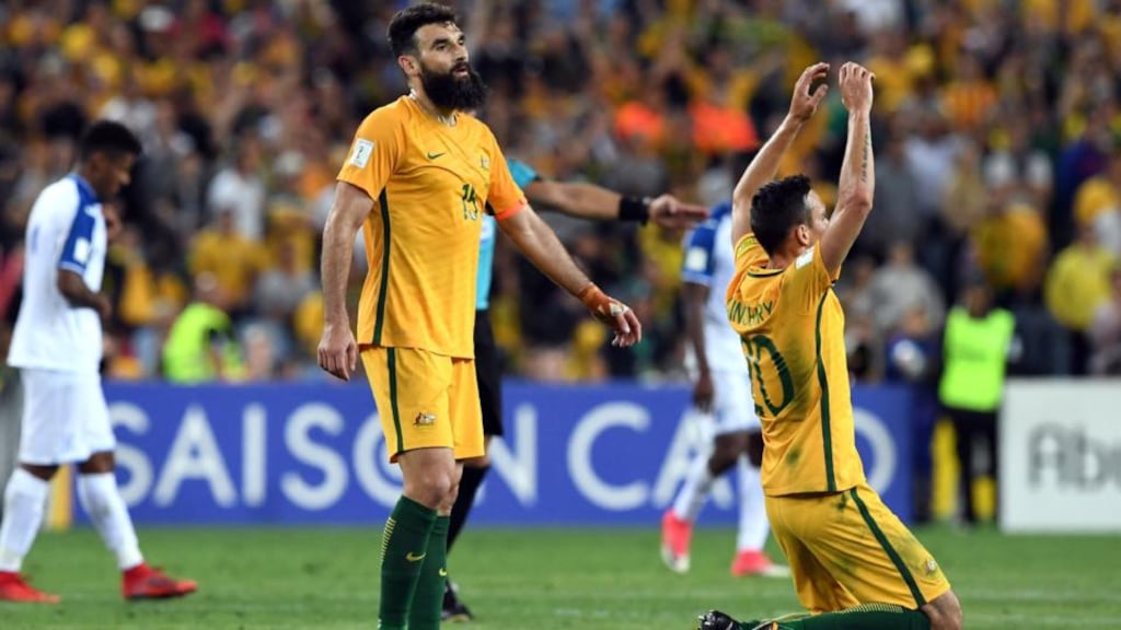 Australia’s Mile Jedinak and Trent Sainsbury celebrate after beating Honduras in their 2018 World Cup qualification play-off football match at Stadium Australia in Sydney. Photograph: Getty Images