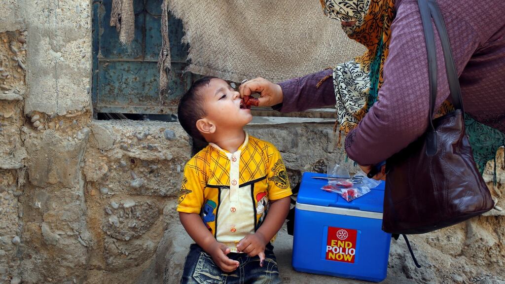 A boy receives polio vaccine drops, during an anti-polio campaign, in a low-income neighbourhood in Karachi, Pakistan April 9, 2018. File photograph: Akhtar Soomro/Reuters