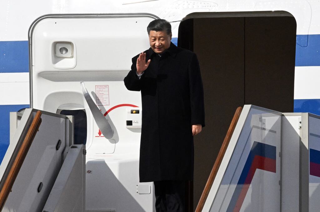 China's President Xi Jinping waves as he disembarks off his aircraft upon arrival at Moscow's Vnukovo airport on March 20, 2023. (Photo by ANATOLIY ZHDANOV/Kommersant Photo/AFP via Getty Images)