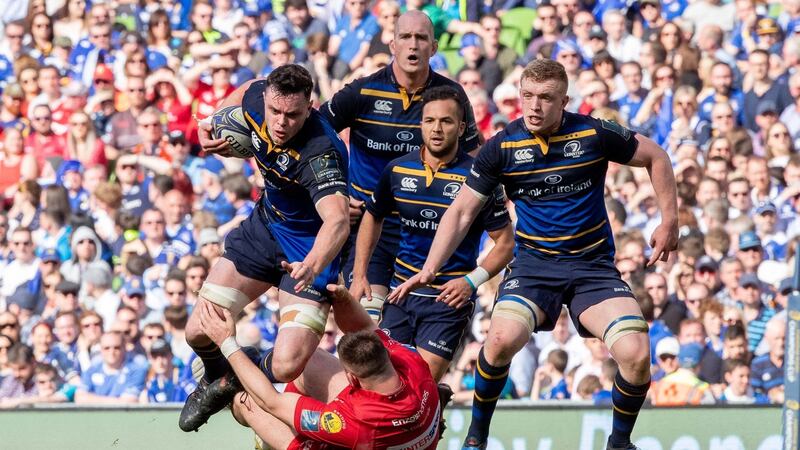 Leinster’s James Ryan is supported by  Devin Toner, Jamison Gibson-Park and Dan Leavy as he runs over the tackle of Rob Evans of Scarlets. Photograph:  Photograph: Morgan Treacy/Inpho